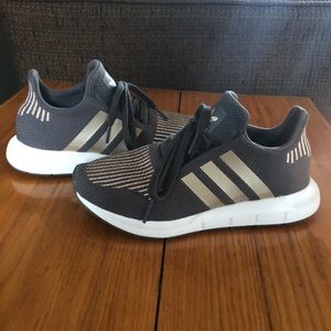 Gently used adidas shoes.